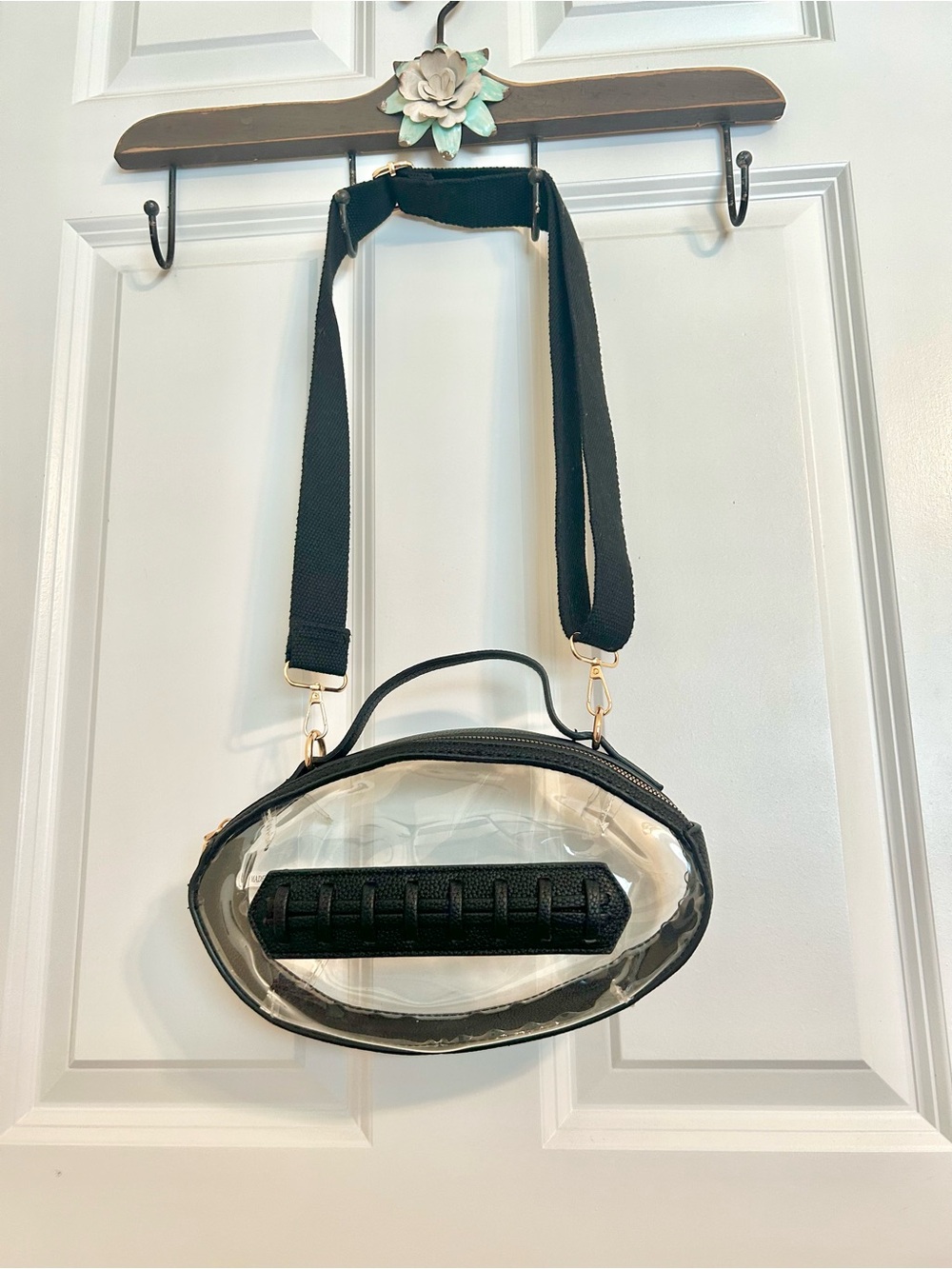 Clear Football shaped Bag with Black Trim and Strap